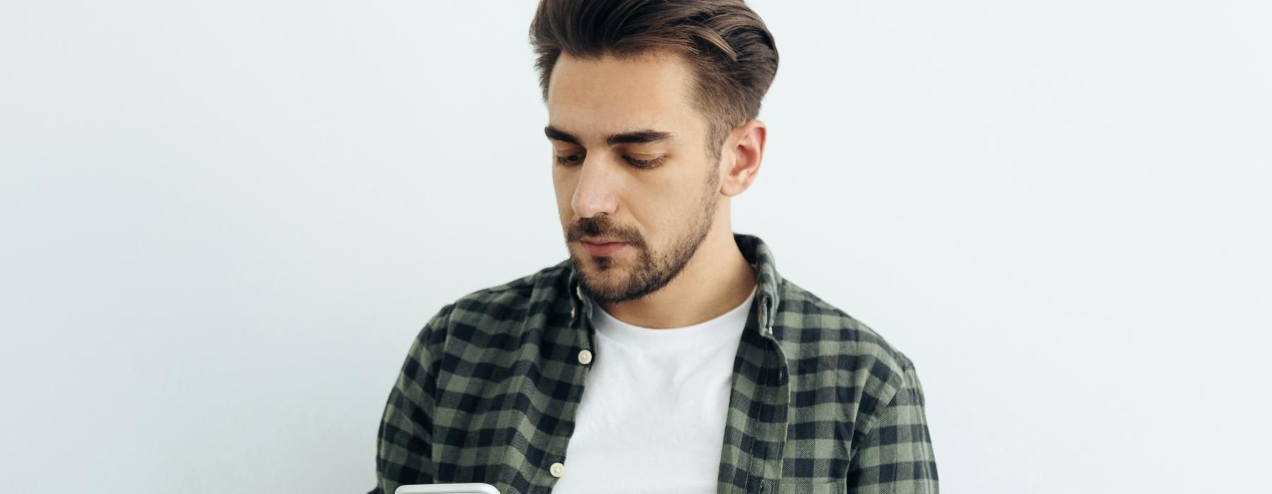 a man holding a phone